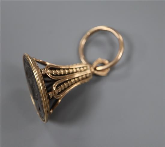 An early 19th century yellow metal overlaid and hardstone set fob seal, 4cm, gross weight 27 grams.